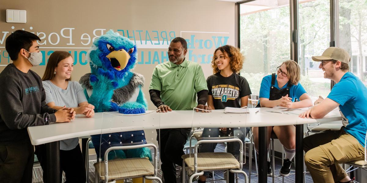 AACC students talking to Swoop.