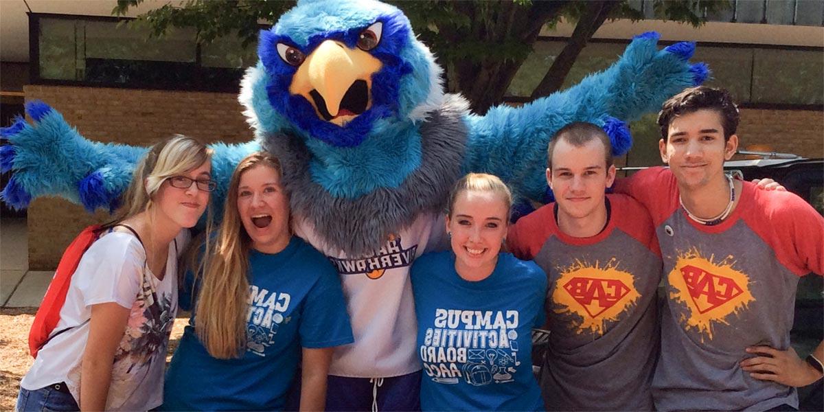 Students pose with Swoop on the quad.